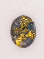 2.46ct Oval Black Gold in Quartz Cabochon