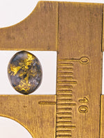 2.46ct Oval Black Gold in Quartz Cabochon