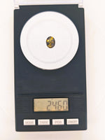 2.46ct Oval Black Gold in Quartz Cabochon