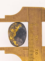 9.39ct Black Gold in Quartz Cabochon