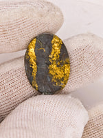 8.67ct Black Oval Gold Quartz Cabochon GRAIL