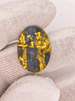 8.67ct Black Oval Gold Quartz Cabochon GRAIL