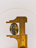 8.67ct Black Oval Gold Quartz Cabochon GRAIL