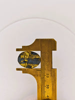 8.67ct Black Oval Gold Quartz Cabochon GRAIL